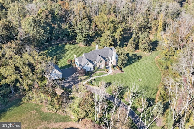 birds eye view of property featuring a rural view