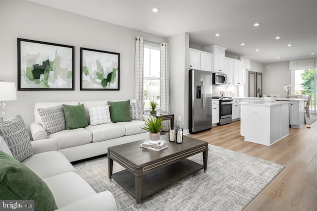 living room featuring light wood-type flooring