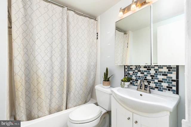 full bathroom with vanity, toilet, shower / tub combo, and backsplash