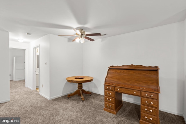 sitting room featuring carpet floors and ceiling fan