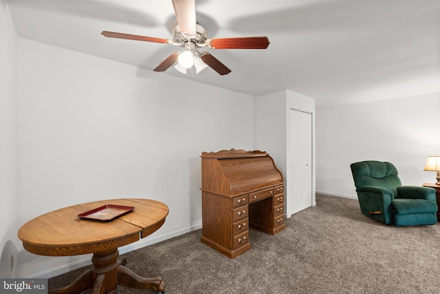 living area with ceiling fan and carpet flooring