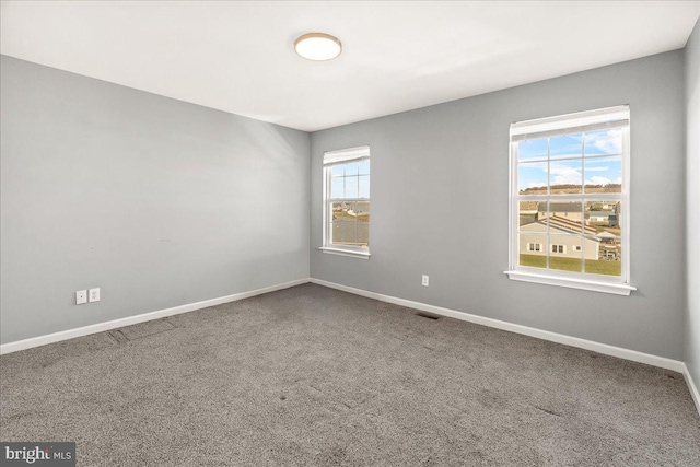 view of carpeted spare room