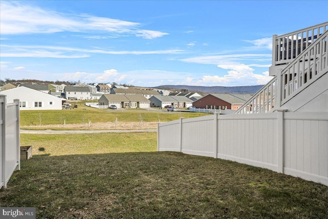 view of yard with a mountain view