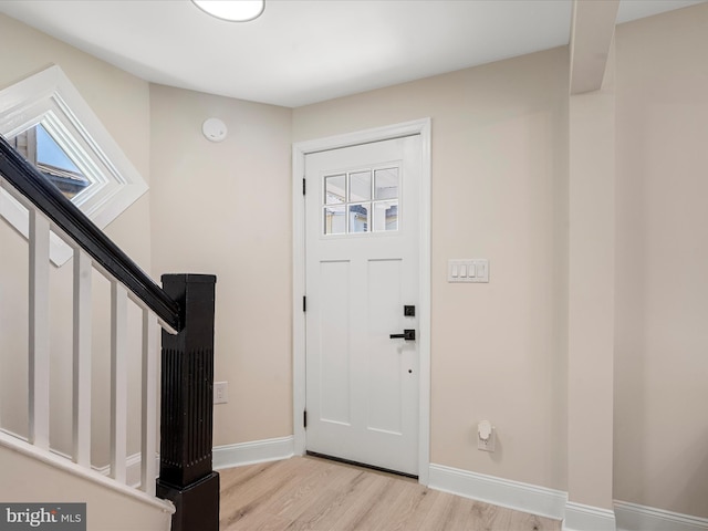 714 W Stephen St, Martinsburg, WV 25401 - foyer entrance with baseboards and light wood-style floors