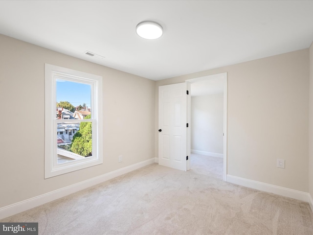 714 W Stephen St, Martinsburg, WV 25401 - empty room with carpet flooring, visible vents, and baseboards