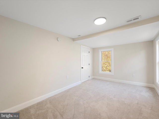 714 W Stephen St, Martinsburg, WV 25401 - empty room with baseboards, visible vents, and carpet floors