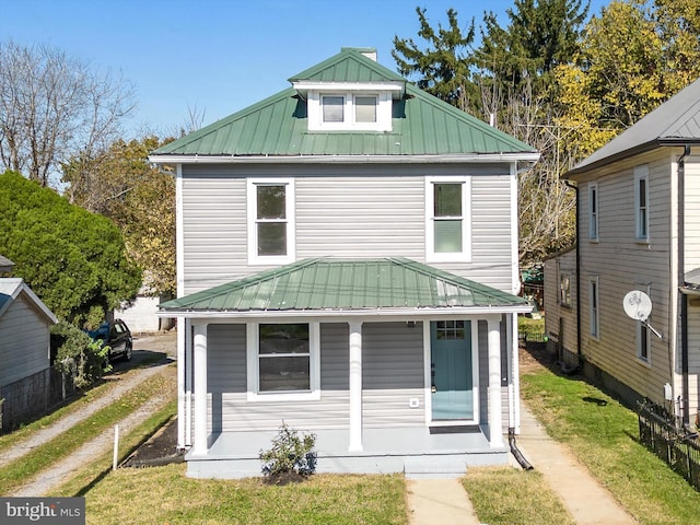 714 W Stephen St, Martinsburg, WV 25401 - rear view of property featuring covered porch and metal roof