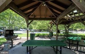 view of home's community with a patio and a gazebo