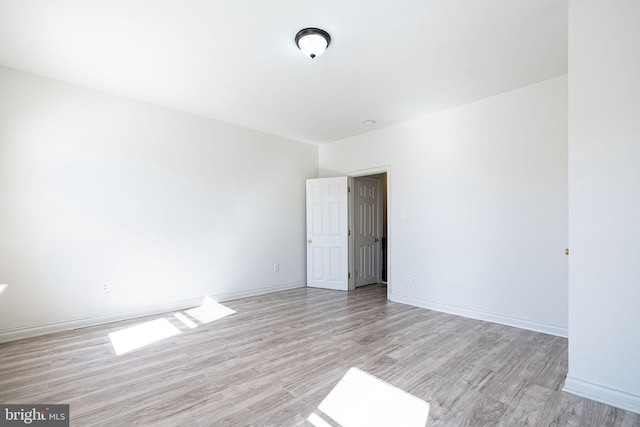 empty room featuring light hardwood / wood-style floors