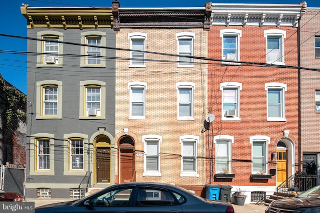 view of front of home with cooling unit