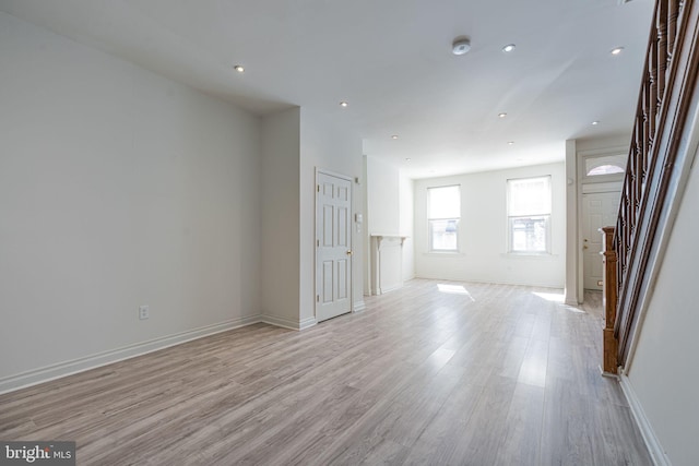 spare room with light wood-type flooring