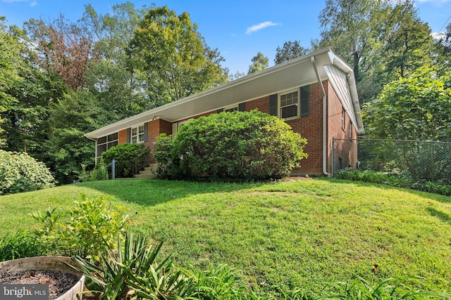 view of front of house with a front lawn