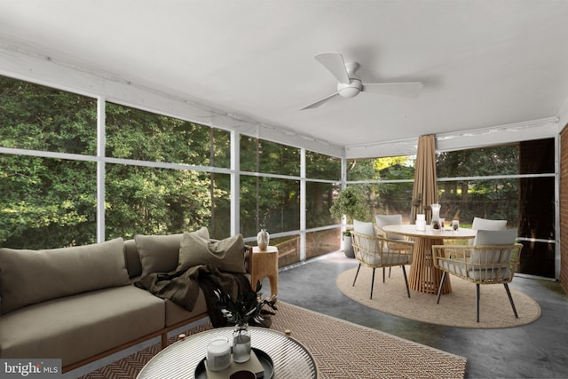 sunroom / solarium with ceiling fan and plenty of natural light