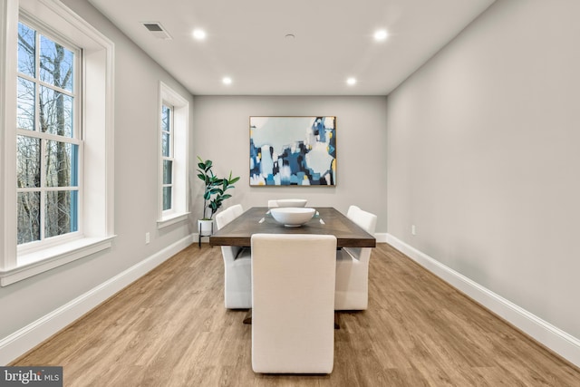 dining area with light wood-type flooring