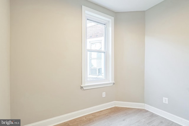 empty room with light wood-type flooring