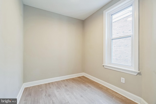 unfurnished room featuring light wood-type flooring