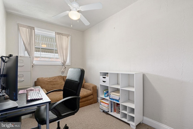 office featuring light colored carpet and ceiling fan