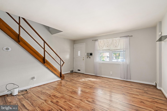 entrance foyer with light wood-type flooring