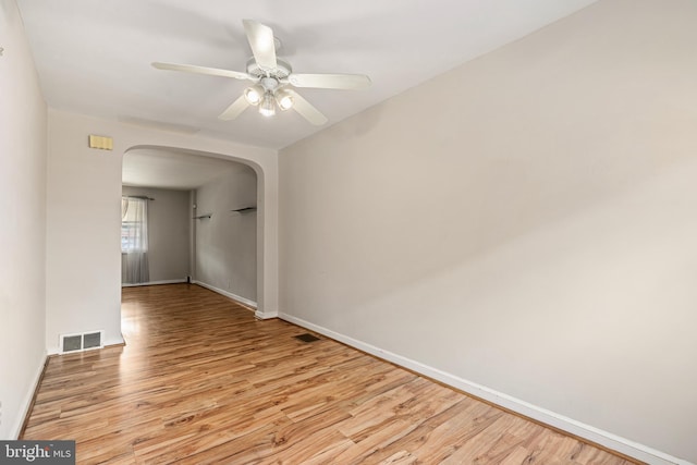 unfurnished room with light hardwood / wood-style floors and ceiling fan