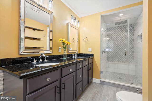 bathroom with vanity and an enclosed shower