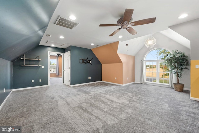 bonus room with ceiling fan, vaulted ceiling, and carpet floors