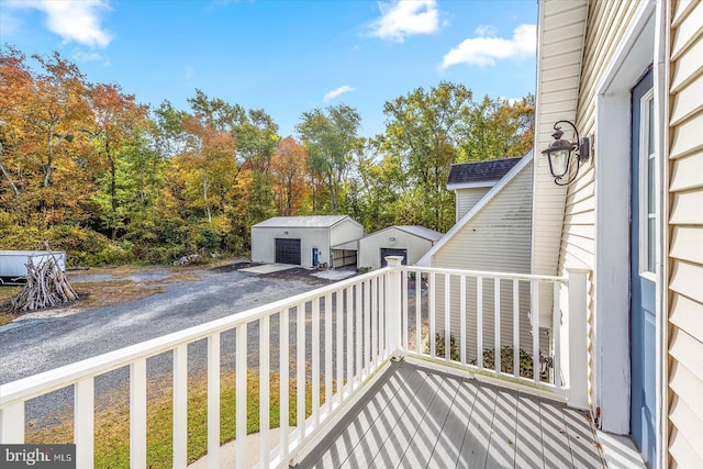 wooden deck featuring a storage shed