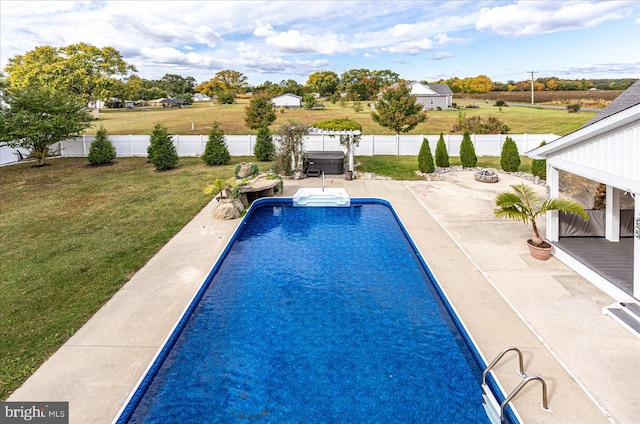 view of pool featuring a patio area and a lawn