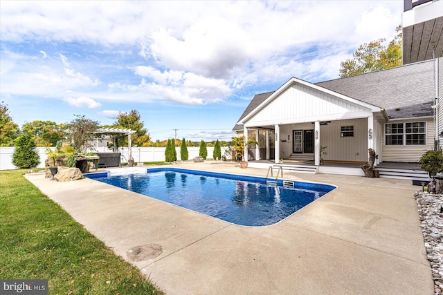 view of pool featuring a patio