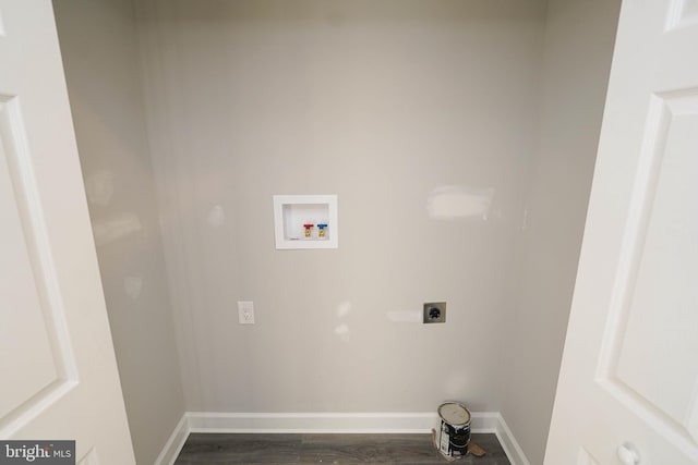 laundry room featuring hookup for a washing machine, hookup for an electric dryer, and dark hardwood / wood-style floors