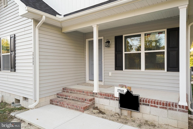 property entrance with a porch