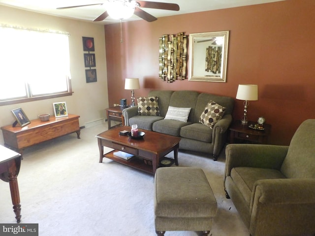 living room featuring light colored carpet and ceiling fan