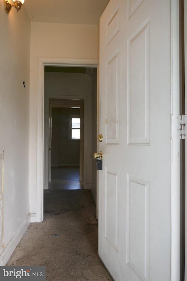 hall featuring carpet floors