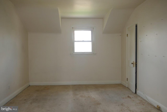 bonus room featuring vaulted ceiling