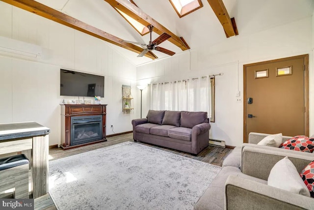 living room with beam ceiling, wood-type flooring, baseboard heating, and ceiling fan