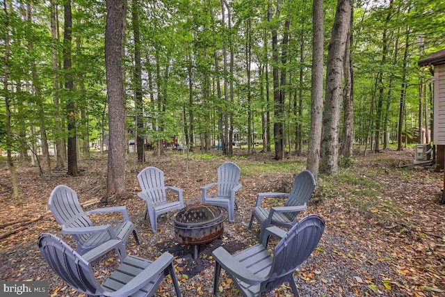 view of patio / terrace featuring a fire pit