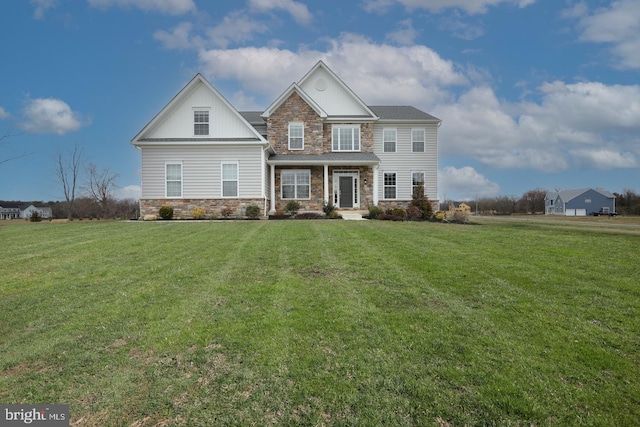 view of front of property with a front lawn