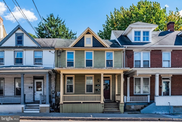 townhome / multi-family property with covered porch