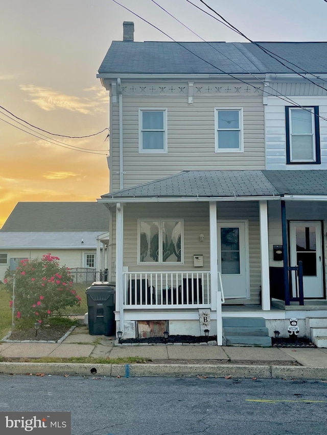 view of front of home featuring covered porch