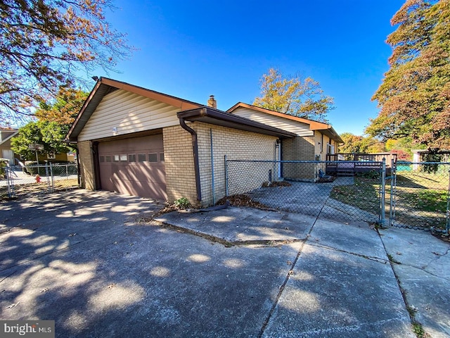 view of home's exterior featuring a garage