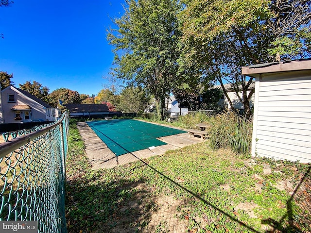 view of pool featuring a patio