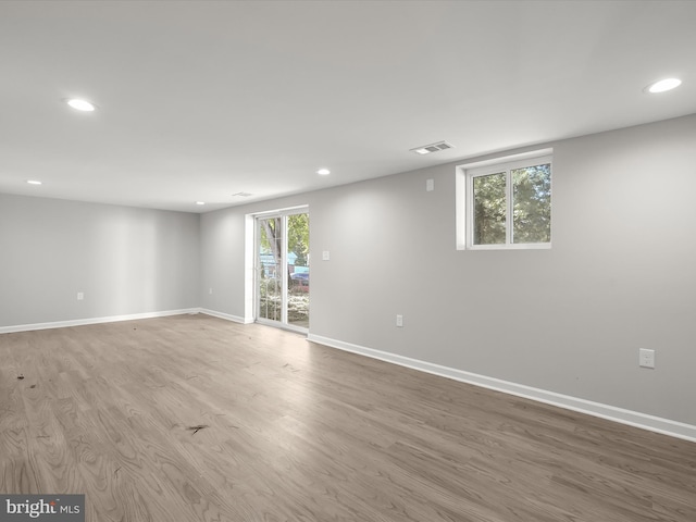 empty room featuring hardwood / wood-style flooring