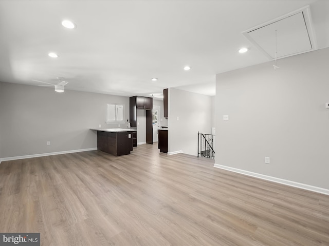 unfurnished living room with light hardwood / wood-style flooring