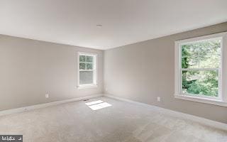 view of carpeted spare room