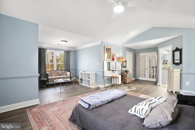 bedroom featuring french doors, ceiling fan, vaulted ceiling, dark wood-type flooring, and ornamental molding