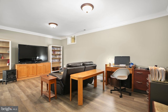 office area featuring ornamental molding and wood-type flooring