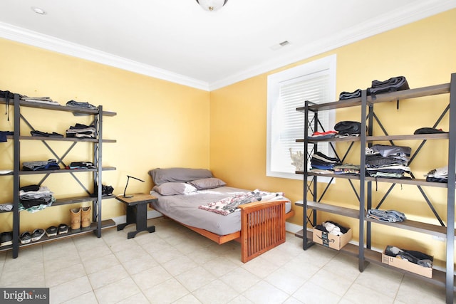 bedroom featuring crown molding