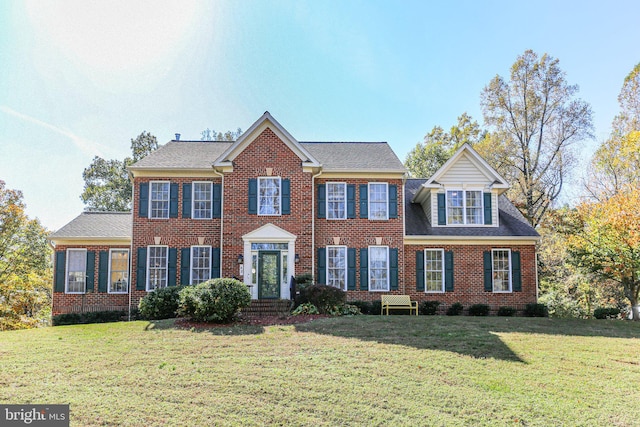 48 Old Creekside Rd, Fredericksburg, VA 22405 - colonial house featuring a front lawn, a shingled roof, and brick siding