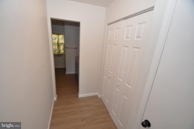 corridor featuring light hardwood / wood-style flooring