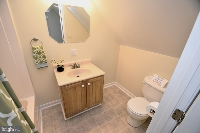 full bathroom with vanity, toilet, and shower / bath combo with shower curtain