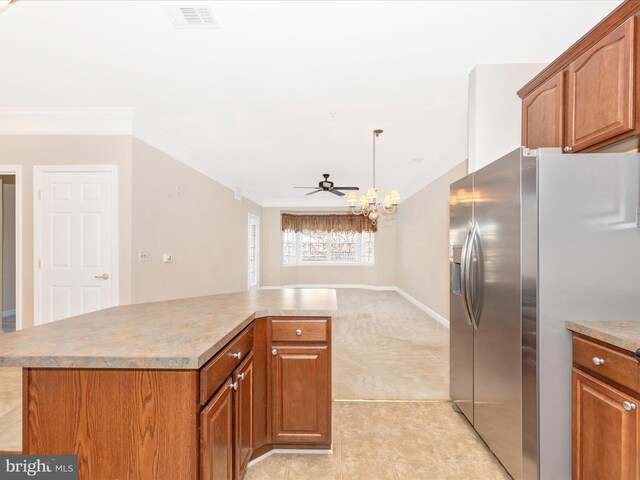 kitchen with light carpet, ornamental molding, stainless steel refrigerator with ice dispenser, a kitchen island, and pendant lighting